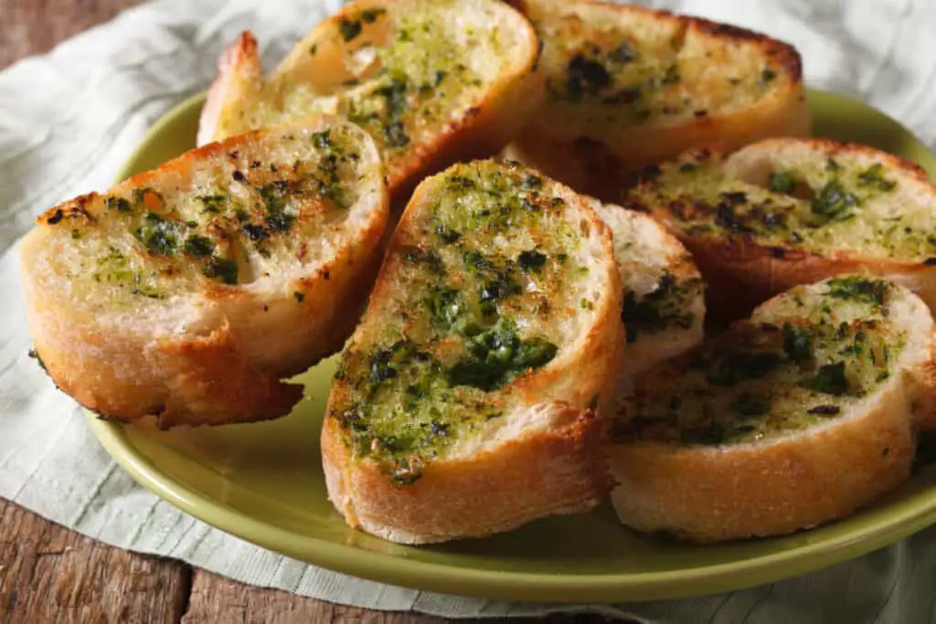Bread with herbs and garlic on a plate