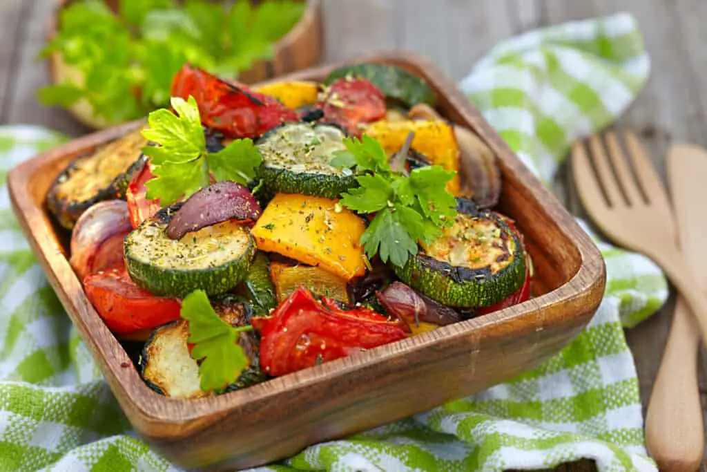 Grilled vegetable salad with zucchini, eggplant, onions, peppers, and tomato