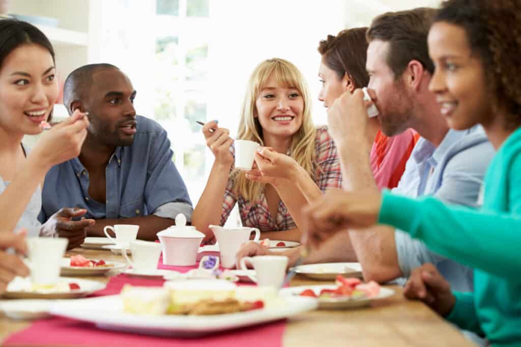 Group Of Friends Having Coffee at a Dinner Party