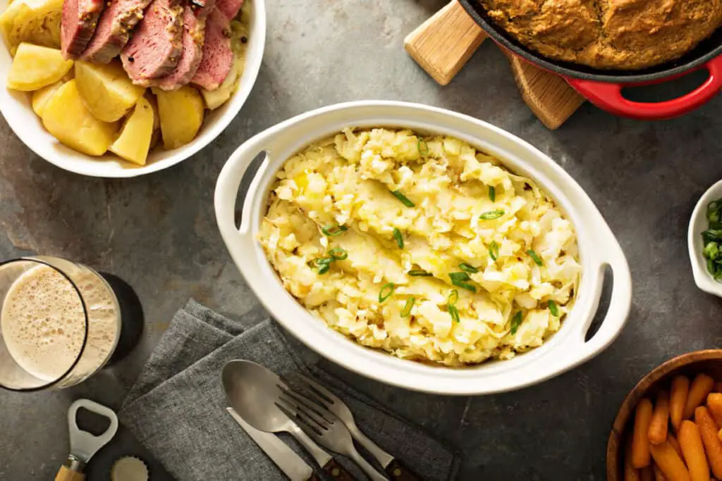 Traditional Irish dinner with corned beef, soda bread, and colcannon