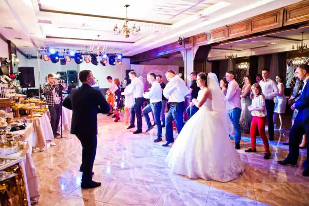 Wedding guests dancing at a reception