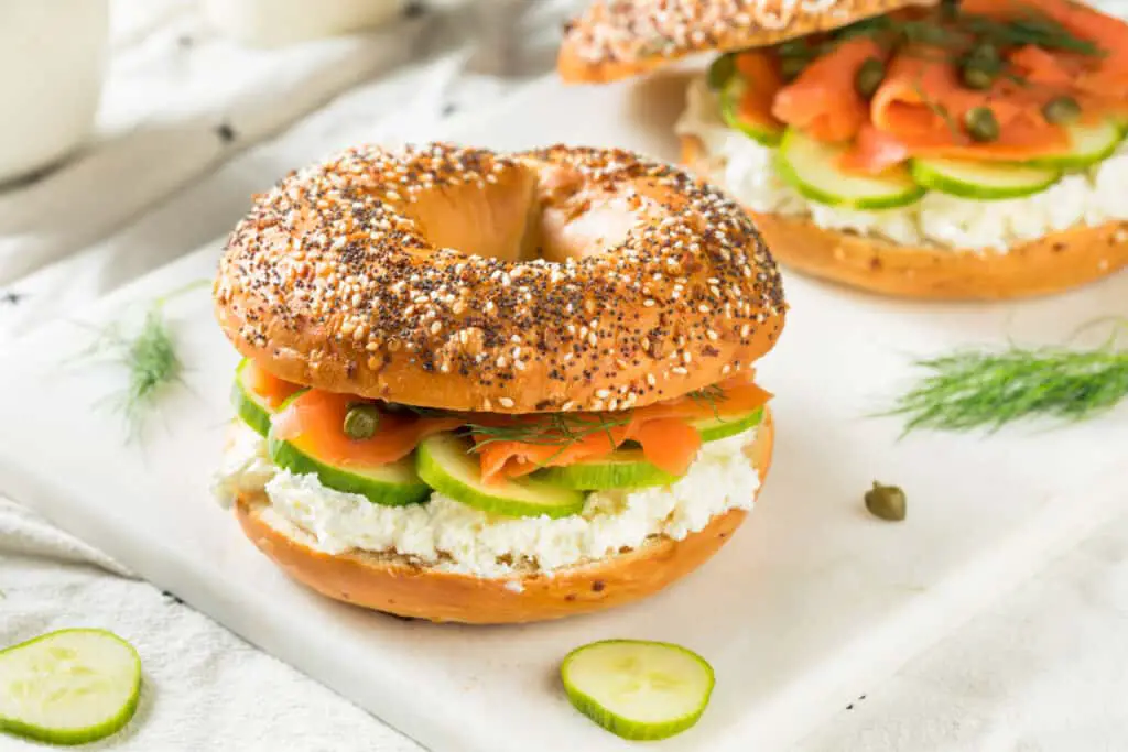 Sesame bagel with salmon lox, cheese, and capers