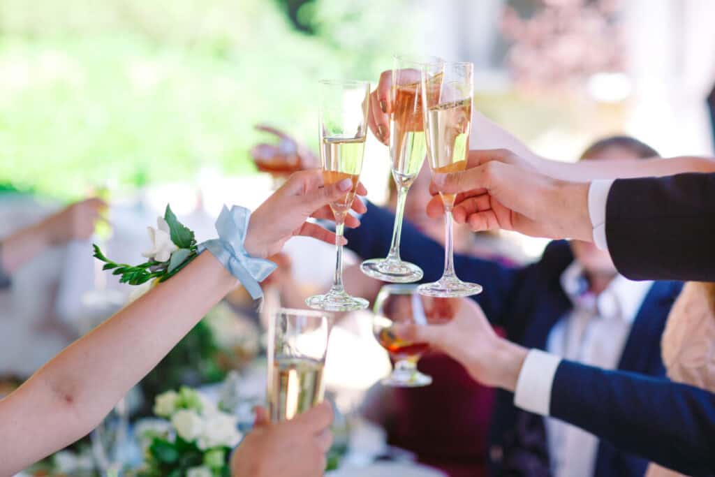 Wedding guests with champagne