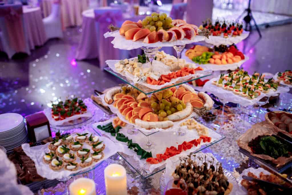 Fruit, cheese, and other appetizers at a wedding