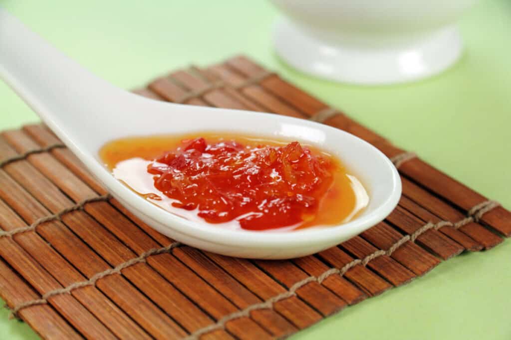 Chinese spoon with sweet chili sauce