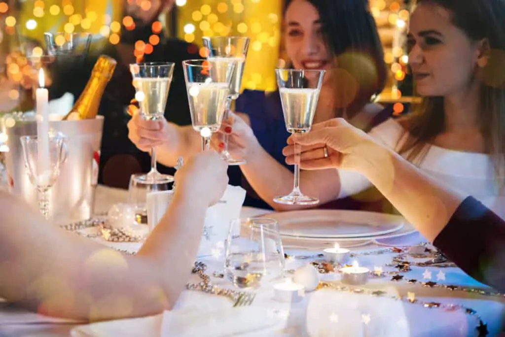 Friends drinking champagne at luxury restaurant