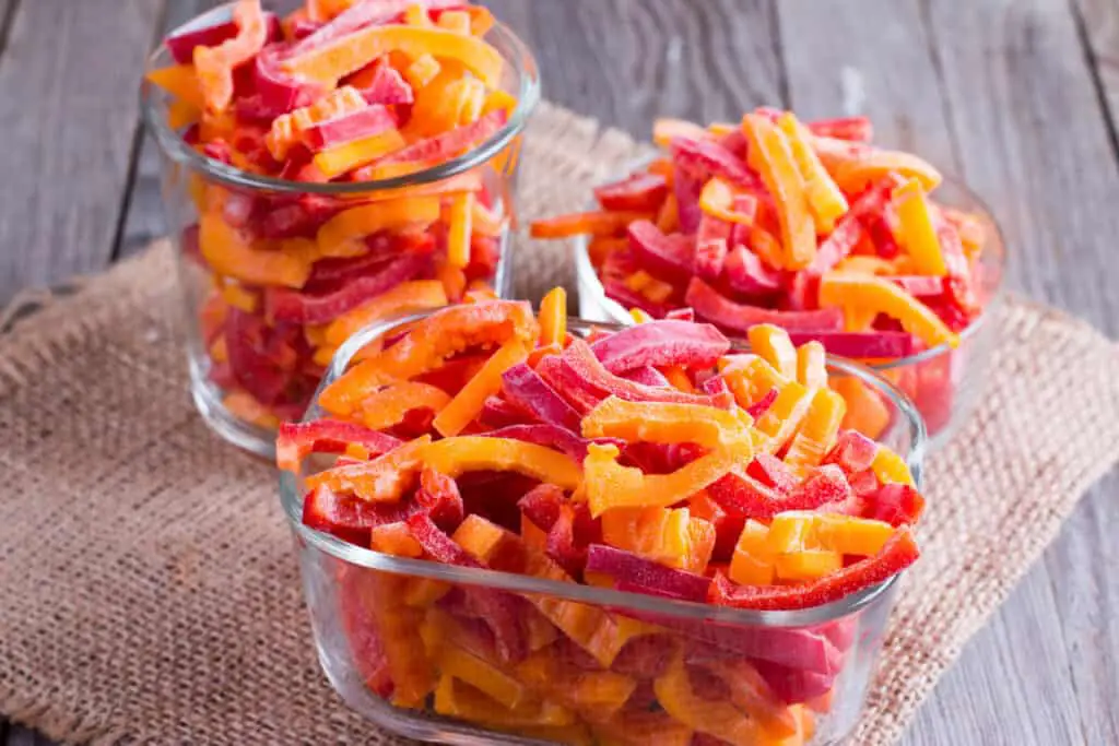 Frozen pieces of red and yellow bell peppers