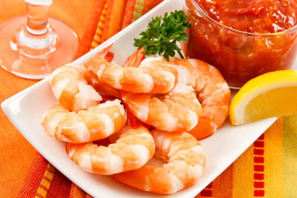 Fresh shrimp with lemon and cocktail sauce