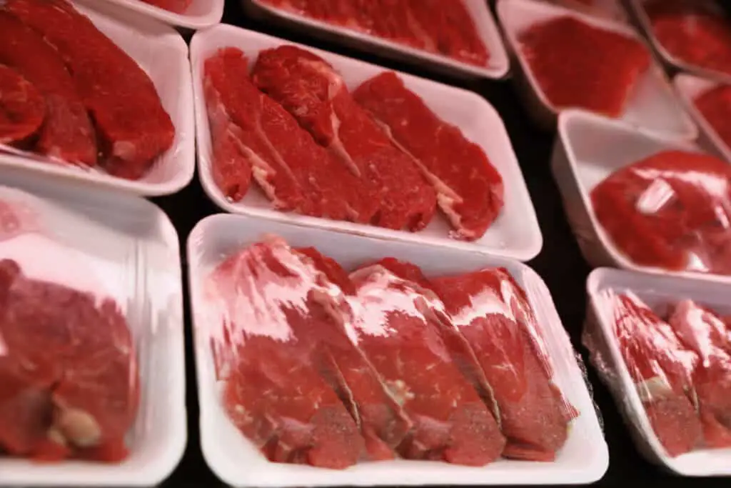 Packages of stew meat at a grocery store