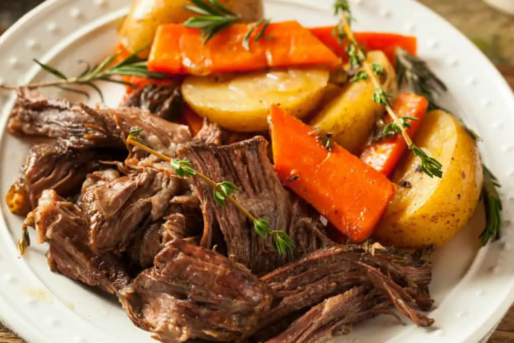 Homemade slow cooker pot roast with carrots and potatoes