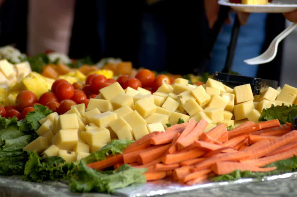 Tray of cheese, tomatoes, and carrots