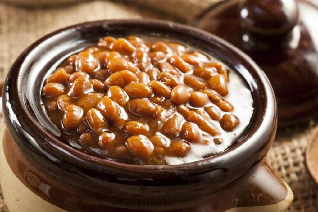 Homemade barbecue baked beans with pork in a bowl
