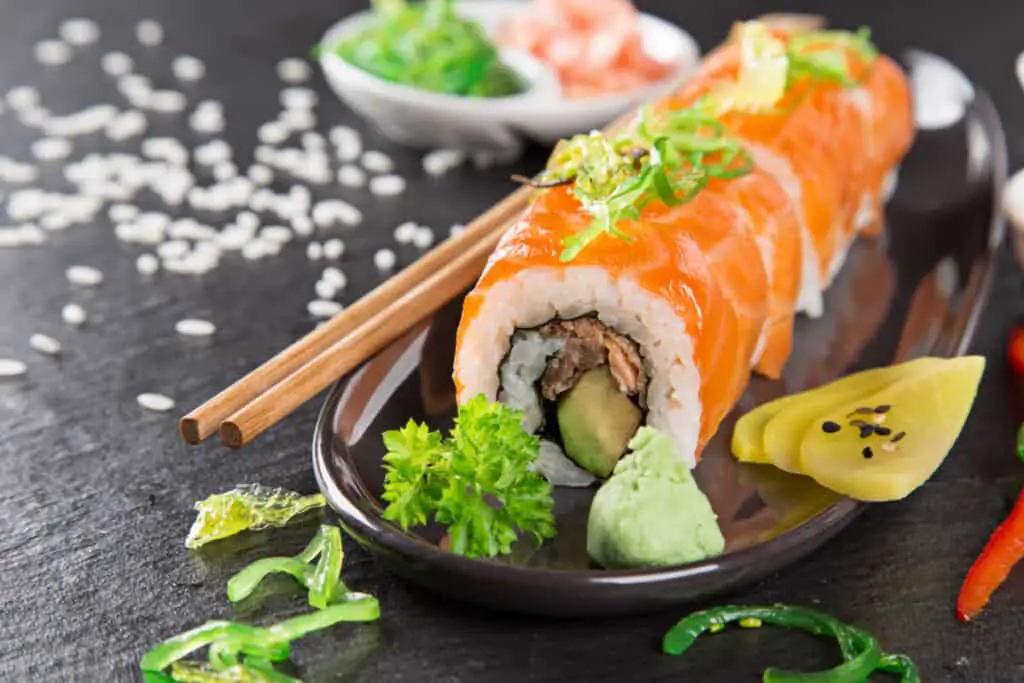 Japanese sushi set on a rustic dark background