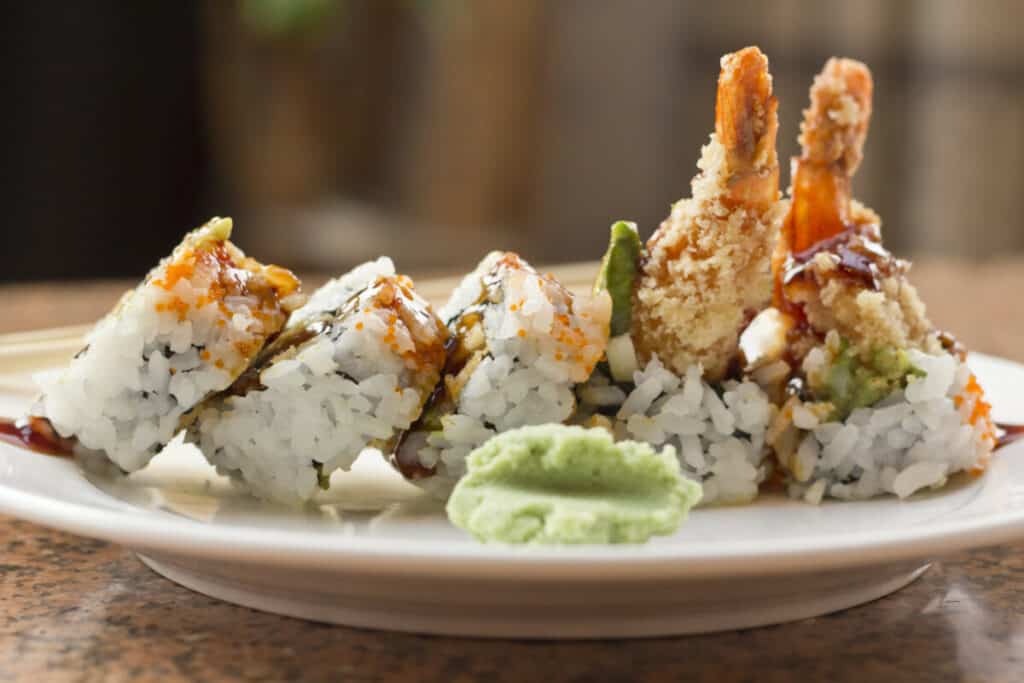 Tempura shrimp sushi roll with wasabi.