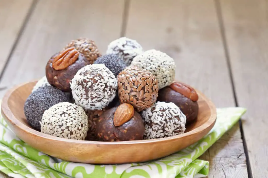Homemade healthy paleo raw energy balls with nuts and dates.