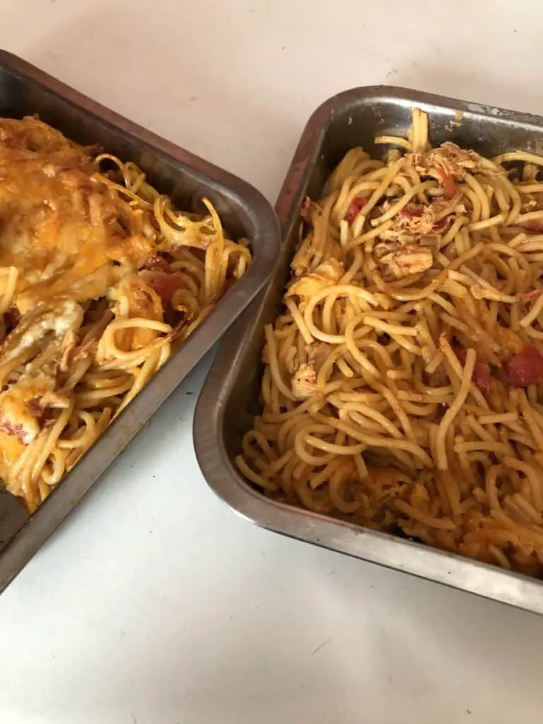 cooked chicken spaghetti bbq casserole divided into two pans